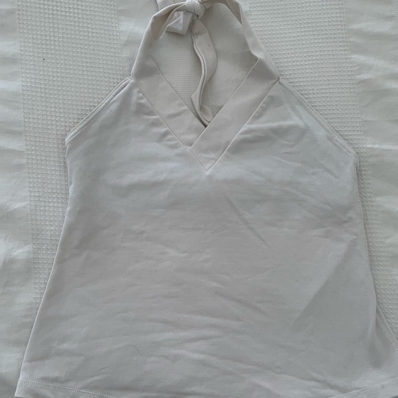 An assortment of Lululemon workout tops - Size 8 - Picture 7 of 8